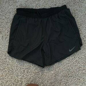 Black Nike running shorts